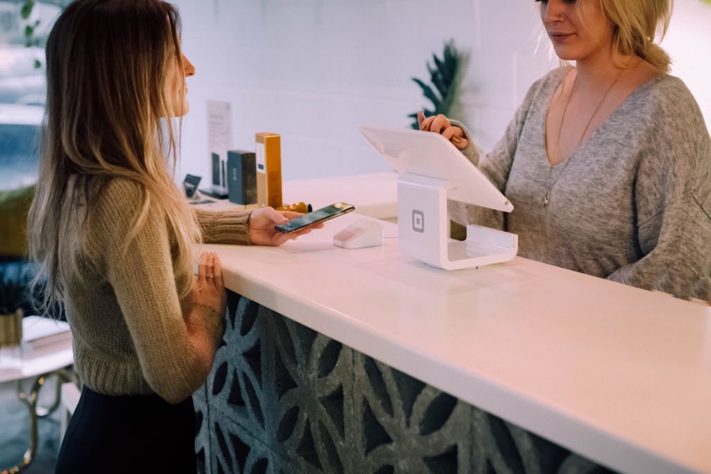 Image of a Clover point of sales system on a counter.