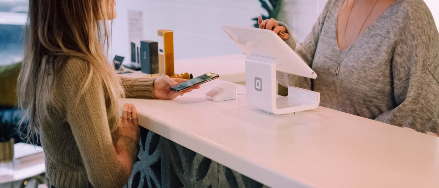 Image of a Clover point of sales system on a counter.