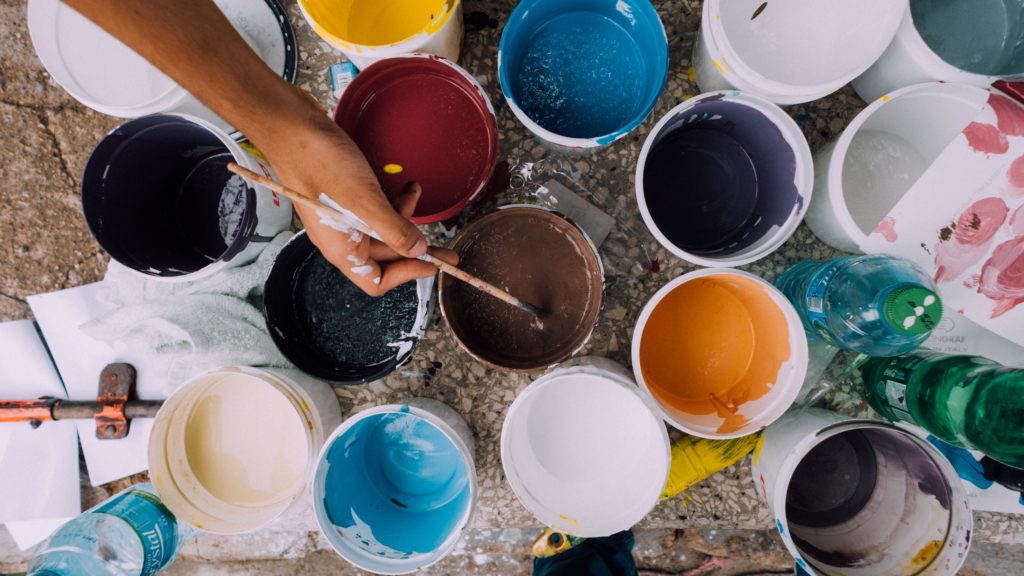 Photo of paint cups on a canvas