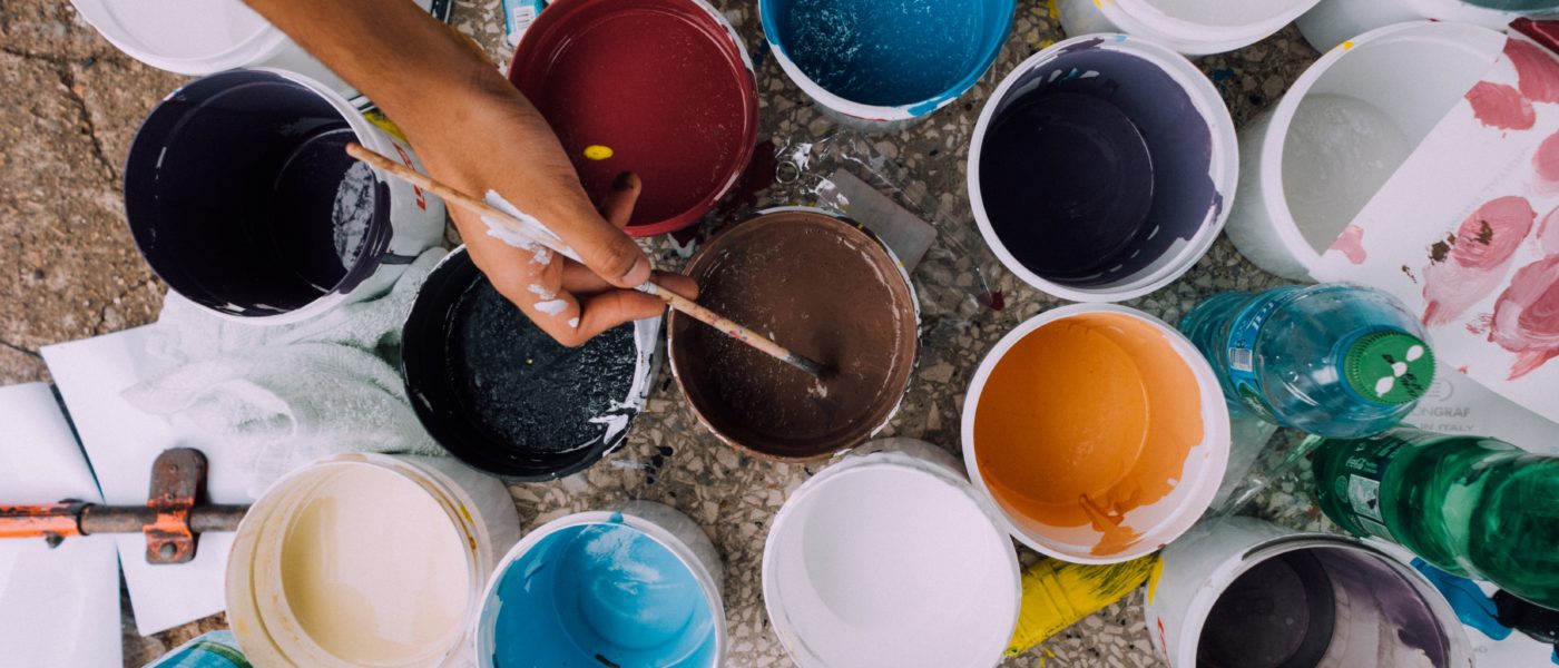 Photo of paint cups on a canvas