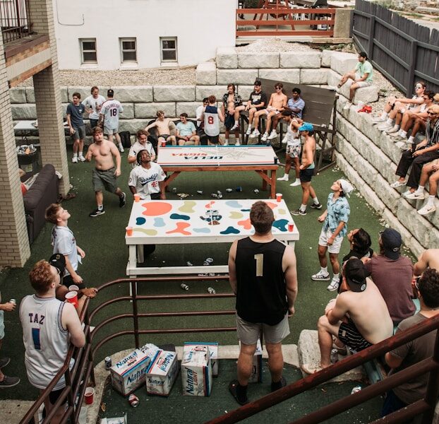 Fraternity Members Playing Beer Games