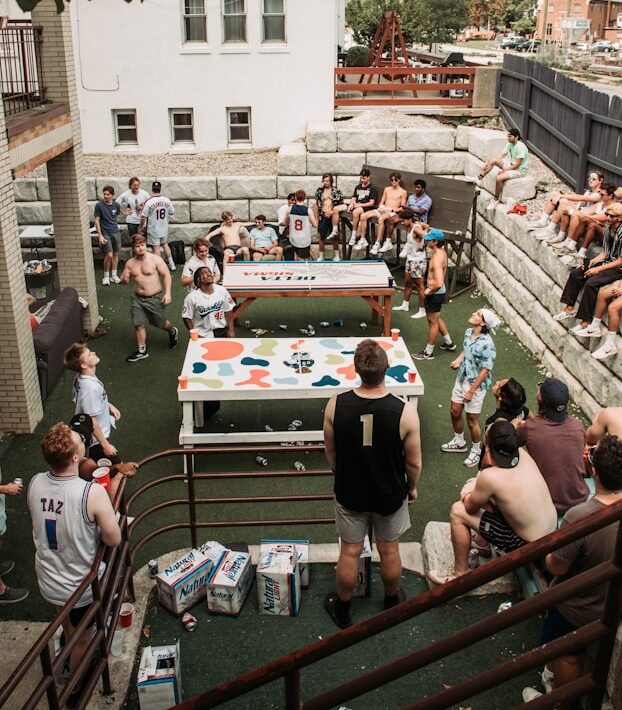 Fraternity Members Playing Beer Games