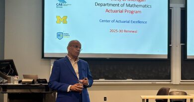 Dr. B. Roger Natarajan giving a presentation